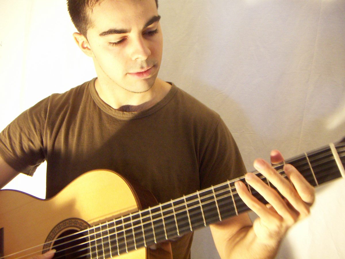 Joram Schito playing classical guitar